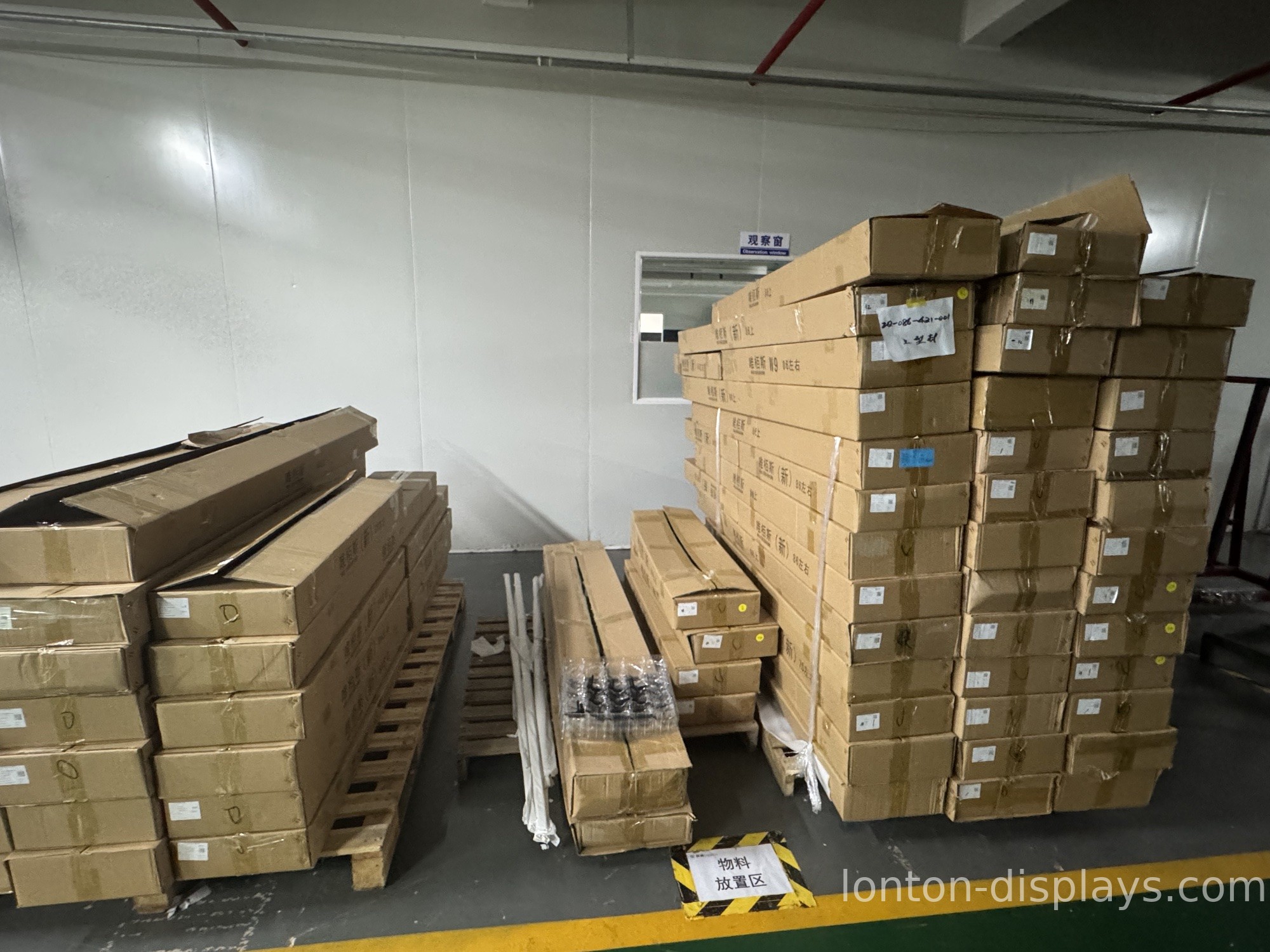 Interactive display in a warehouse material storage area
